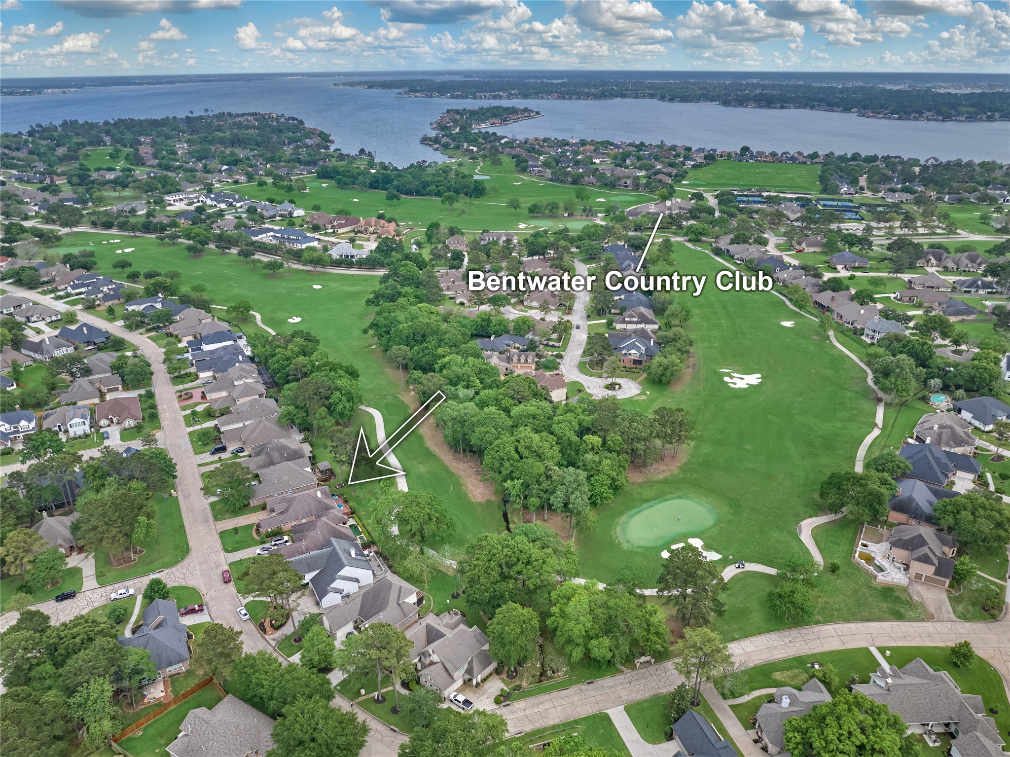 197 Monterrey Road East Montgomery, TX 77356 - Photo 2 of 50 Perfectly situated just a short golf cart ride from the country club and neighborhood amenities, offering effortless access to leisure and recreation.
