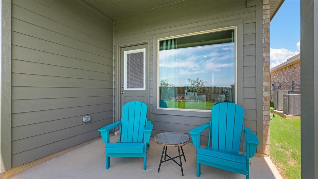 620 Harvey Street Grandview, TX 76050 - Photo 38 of 39 Patio - All Home and community information, including pricing, included features, terms, availability and amenities, are subject to change at any time without notice or obligation. All Drawings, pictures, photographs, video, square footages, floor plans, elevations, features, colors and sizes are approximate for illustration purposes only and will vary from the homes as built.
