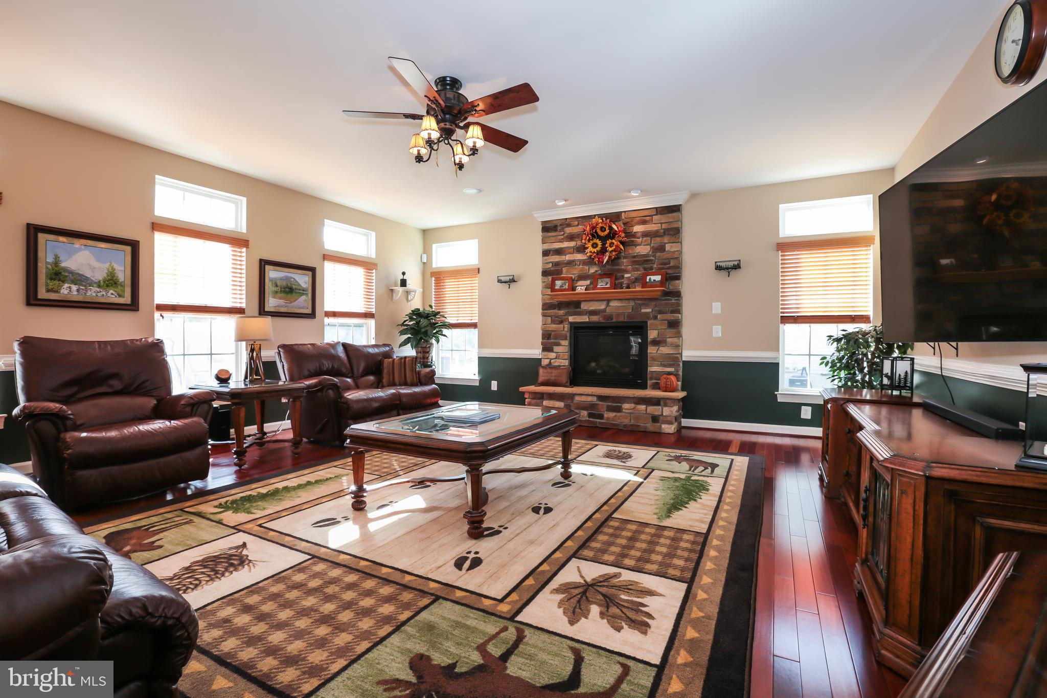 4557 Spring Run Road Warrenton, VA 20187 - Photo 14 of 68 Cozy Stone Gas Fireplace in Family Room