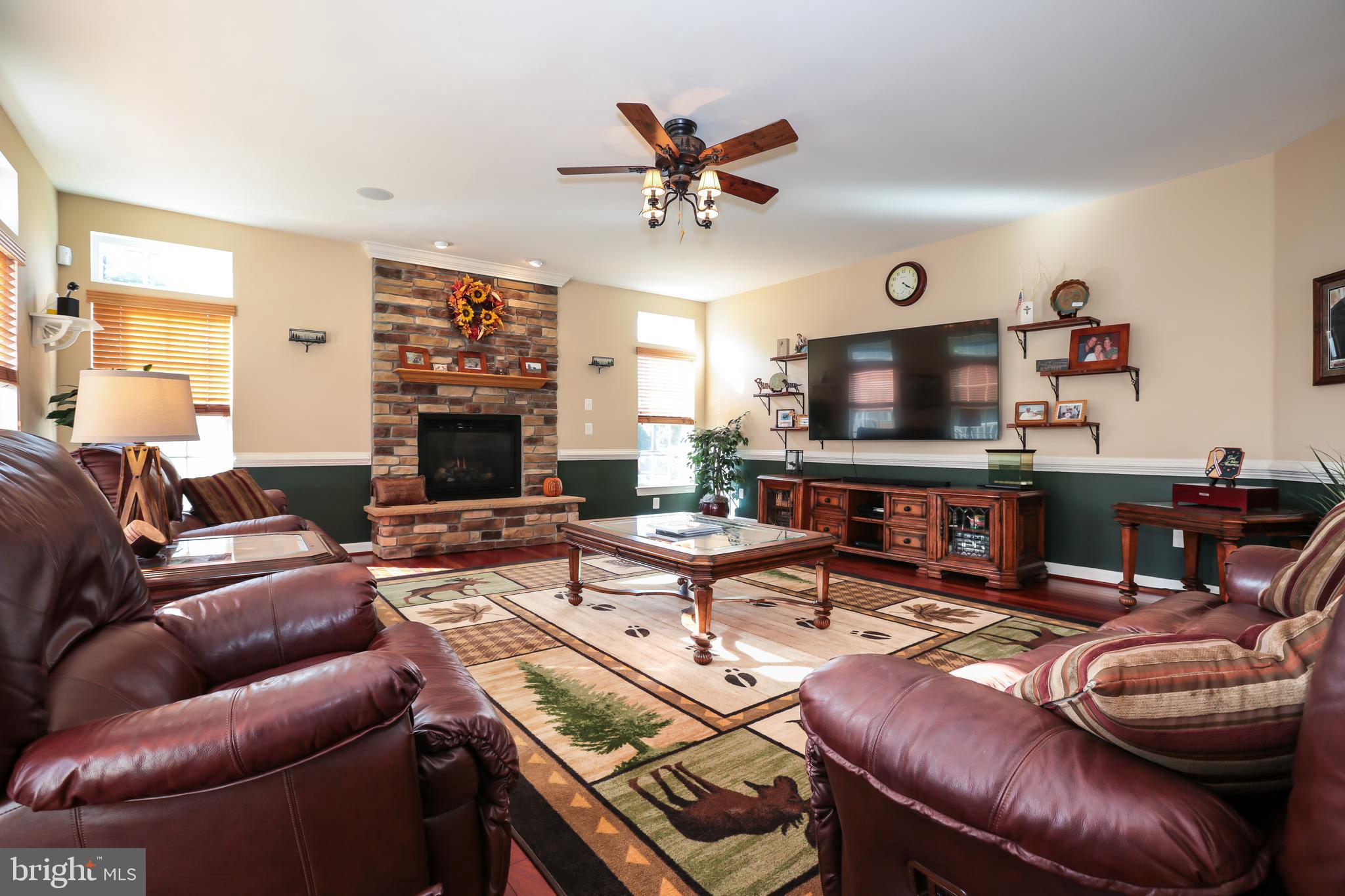 4557 Spring Run Road Warrenton, VA 20187 - Photo 15 of 68 Cozy Stone Gas Fireplace in Family Room