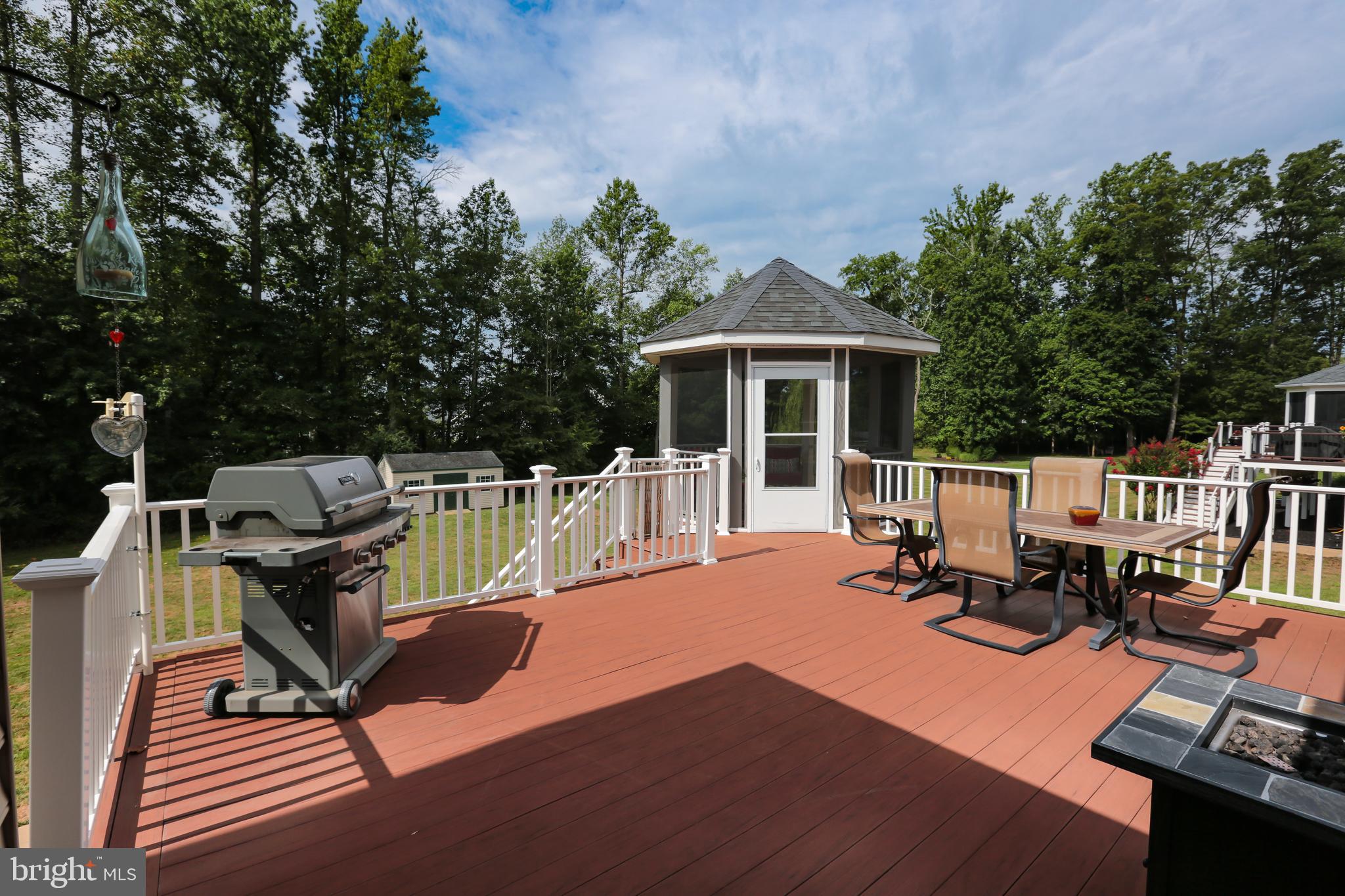 4557 Spring Run Road Warrenton, VA 20187 - Photo 56 of 68 Large Composite Deck with Beautiful Tree Views