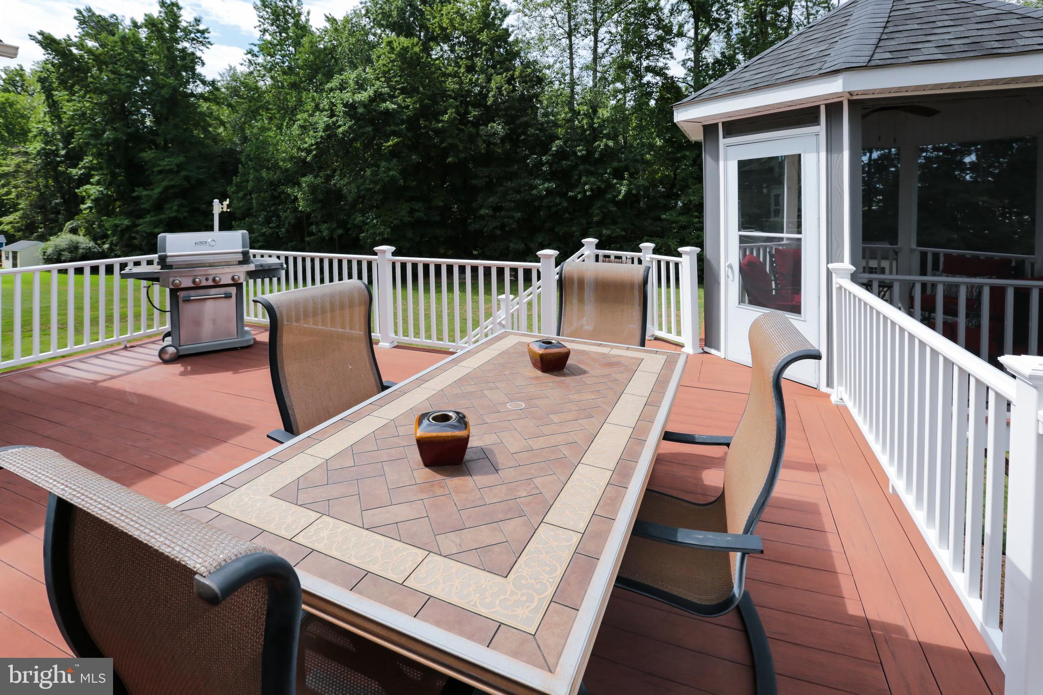 4557 Spring Run Road Warrenton, VA 20187 - Photo 58 of 68 Large Composite Deck with Beautiful Tree Views