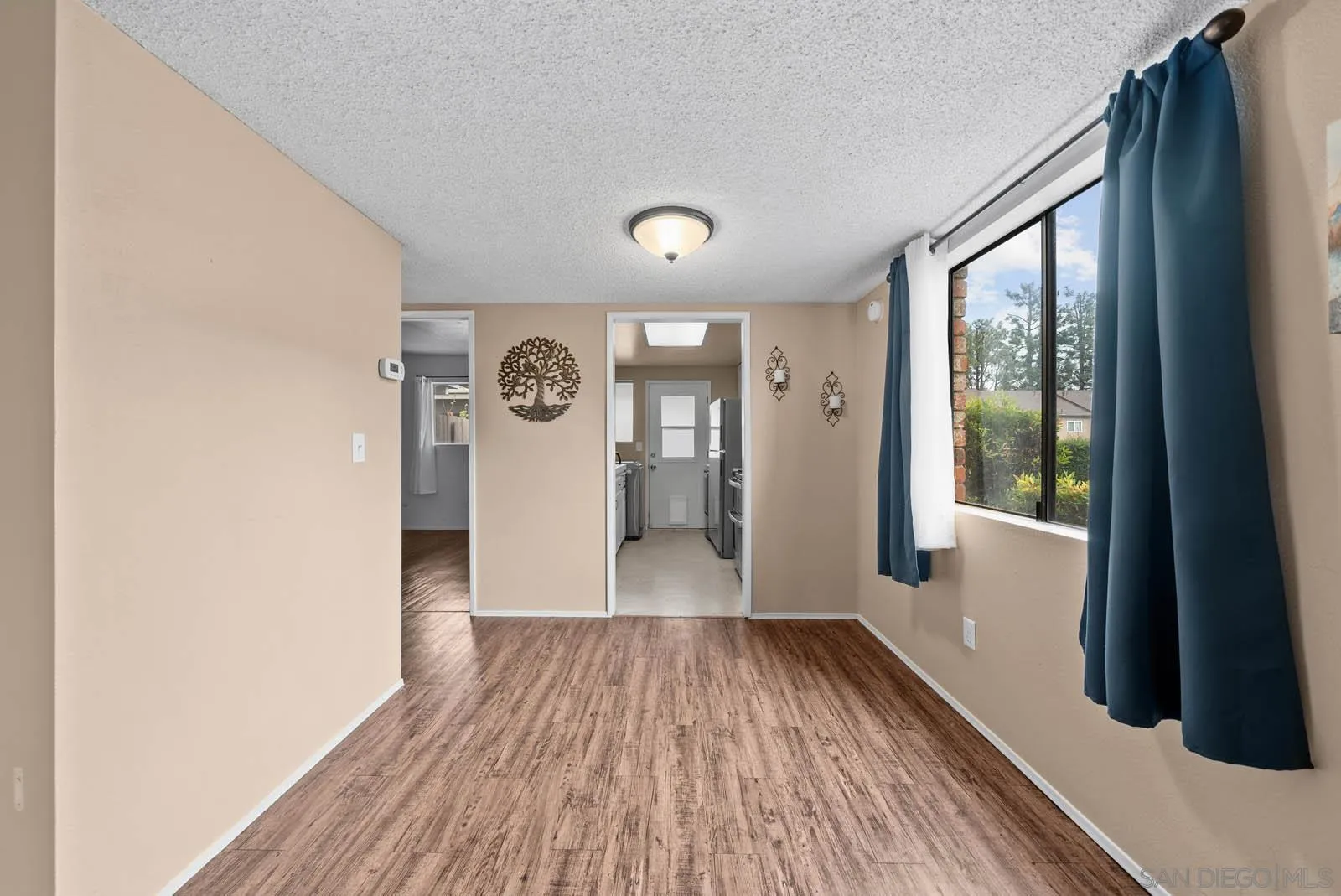 11911 Royal Road, Unit G El Cajon, CA 92021 - Photo 8 of 31 a view of gallery with wooden floor