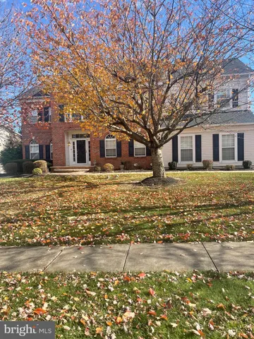 a front view of house with yard