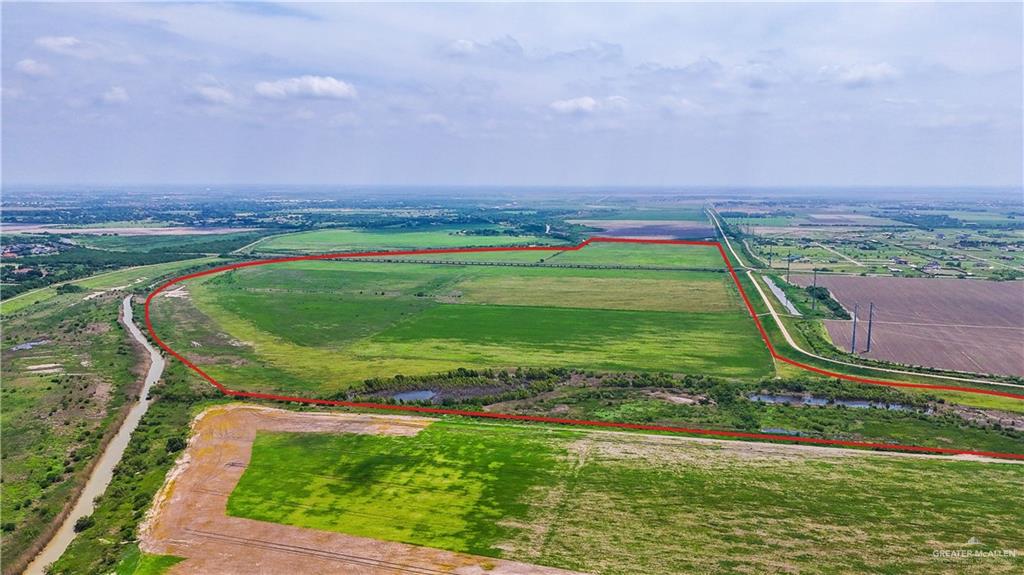 0 Fm 88 Weslaco, TX 78596 - Photo 6 of 7 a view of a golf ground with huge green field and large trees