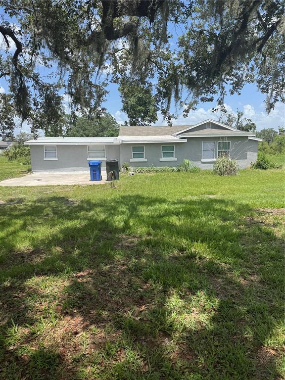 10802 Balm Riverview Road Riverview, FL 33569 - Photo 1 of 1 a front view of a house with a yard