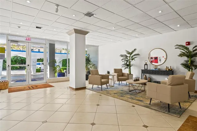 a living room with furniture and a table