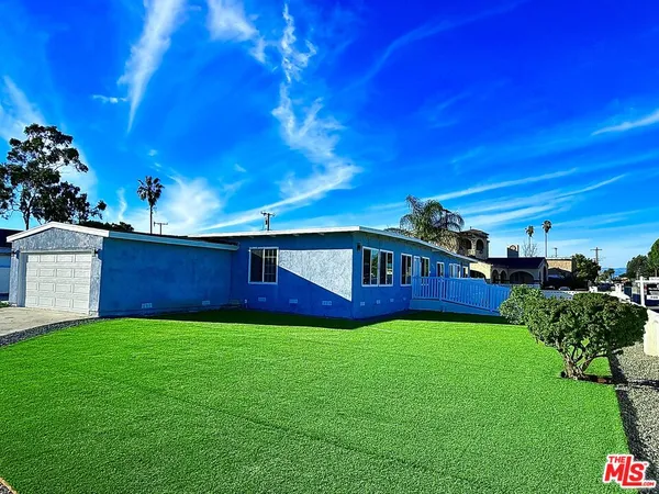 a view of a backyard with a garden