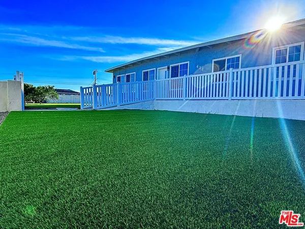 a view of a house with a big yard
