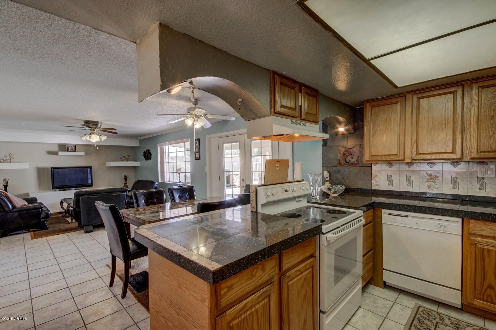 2326 East Cactus Road Phoenix, AZ 85022 - Photo 9 of 27 Kitchen and Eat-in Area