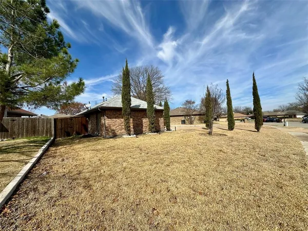 a view of a street with houses
