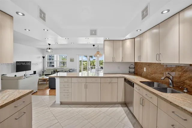 a living room with furniture and windows
