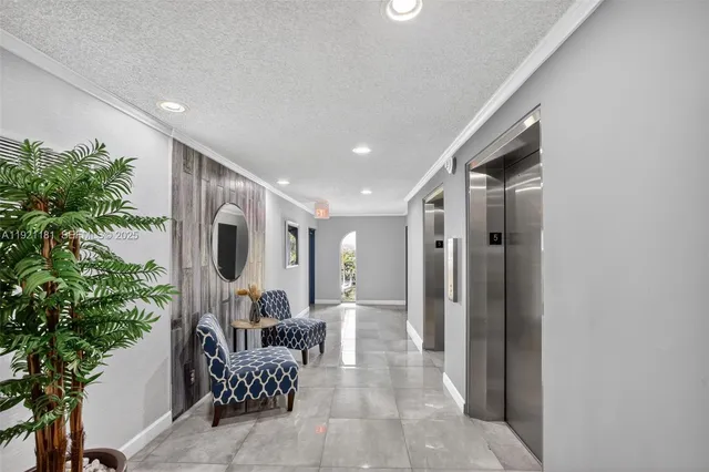 a view of a street with a building in the background