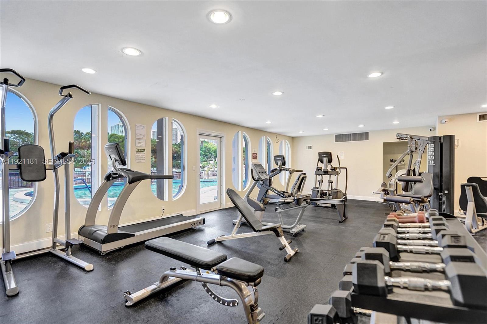 200 Diplomat Parkway, Unit 531 Hallandale Beach, FL 33009 - Photo 37 of 45 a view of a room with gym equipment