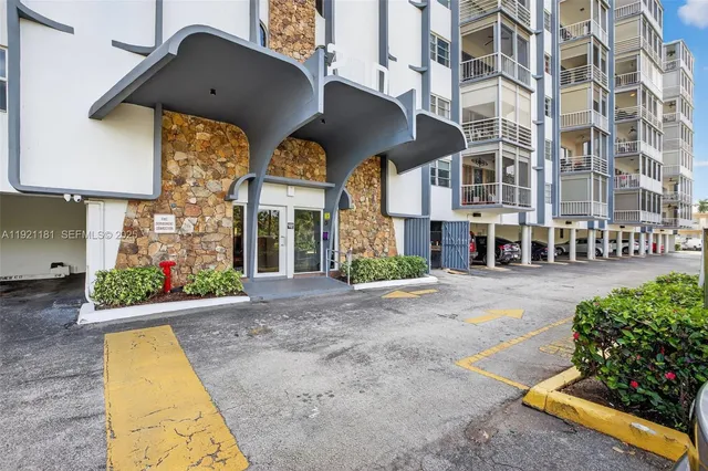 a view of a swimming pool with lawn chairs