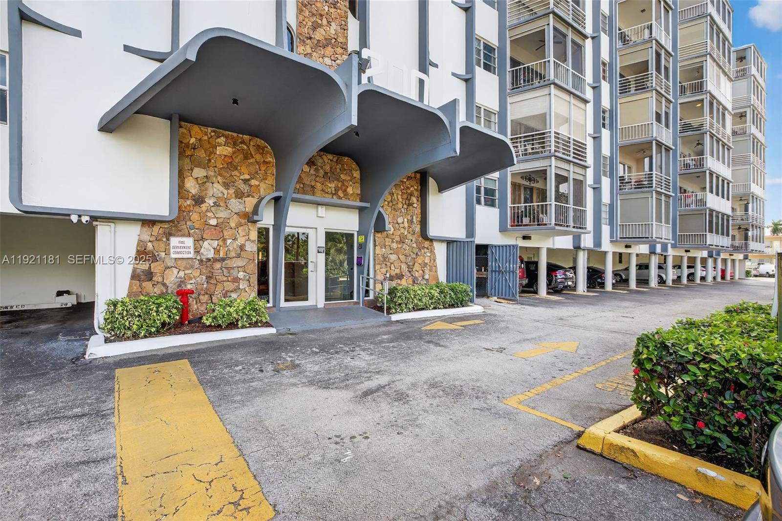 200 Diplomat Parkway, Unit 531 Hallandale Beach, FL 33009 - Photo 39 of 45 a view of a building with many windows