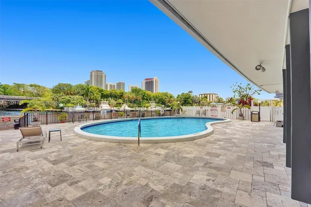 a view of a balcony with two chairs