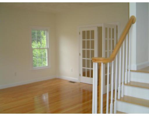 8 Stonebridge Road Groveland, MA 01834 - Photo 3 of 20 a view of an empty room with a window