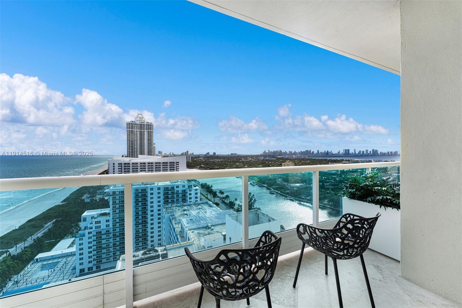 5025 Collins Avenue, Unit PH1 Miami Beach, FL 33140 - Photo 14 of 62 a view of a chairs and table in the balcony