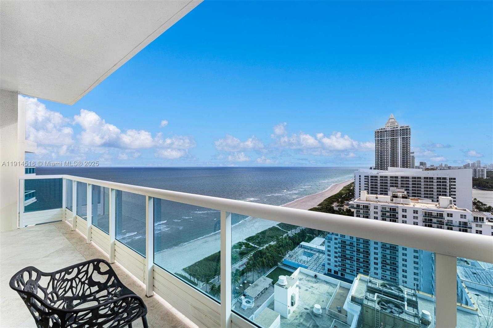 5025 Collins Avenue, Unit PH1 Miami Beach, FL 33140 - Photo 15 of 62 a view of balcony with two chairs and a table