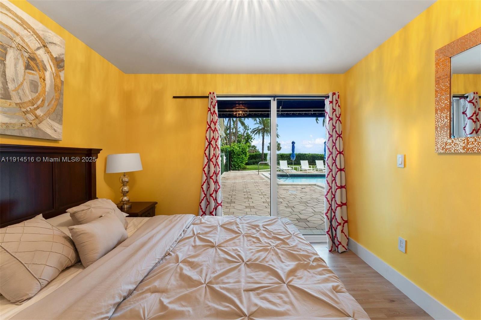 5025 Collins Avenue, Unit PH1 Miami Beach, FL 33140 - Photo 54 of 62 a bedroom with a bed and a window