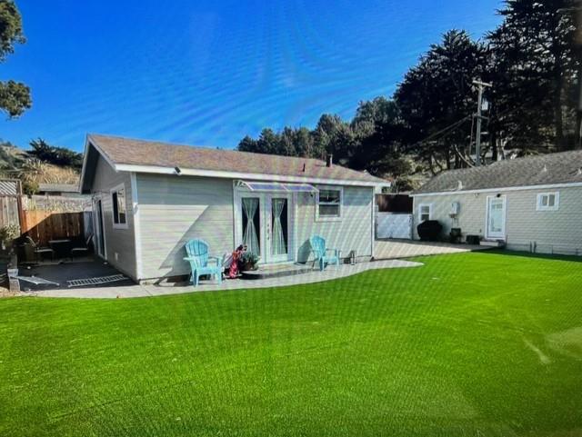333 Brighton Road Pacifica, CA 94044 - Photo 2 of 14 a view of a house with backyard and porch