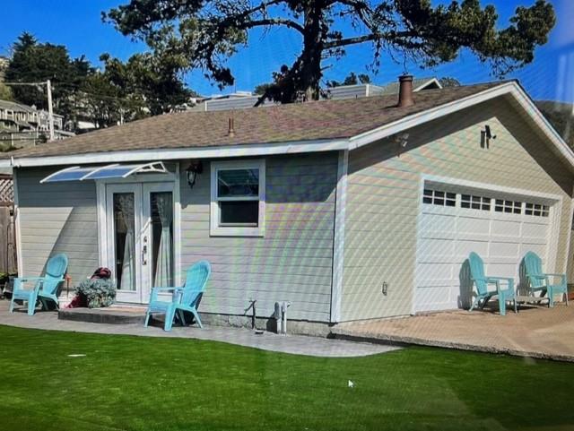 333 Brighton Road Pacifica, CA 94044 - Photo 3 of 14 a front view of a house with a yard