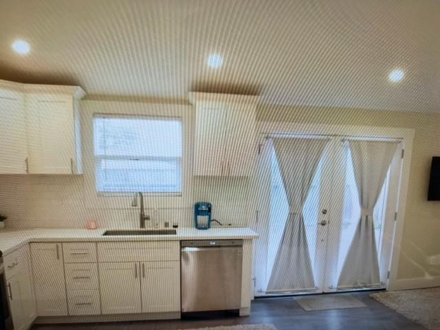 333 Brighton Road Pacifica, CA 94044 - Photo 10 of 14 a kitchen with a sink a window and cabinets
