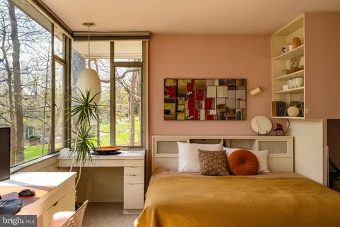 a view of a livingroom with furniture and window