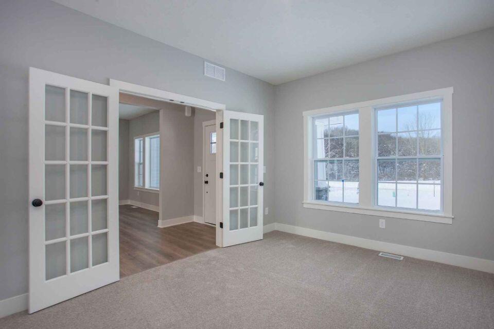 212 Jason Ridge Court Southwest Grand Rapids, MI 49534 - Photo 4 of 35 VLF022-T3390-Den
