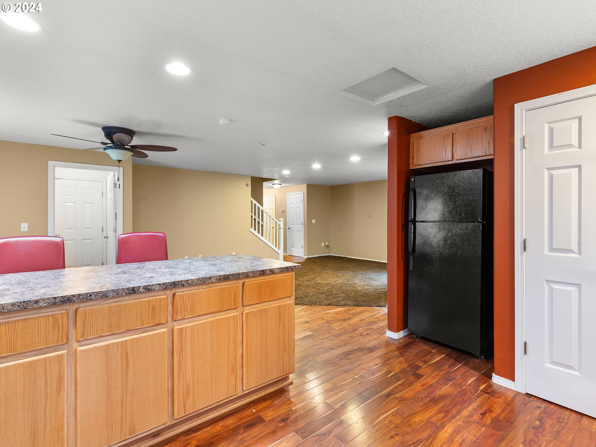 2931 South Cedar Ridge Drive Ridgefield, WA 98642 - Photo 9 of 22 a kitchen with stainless steel appliances granite countertop a refrigerator and a sink