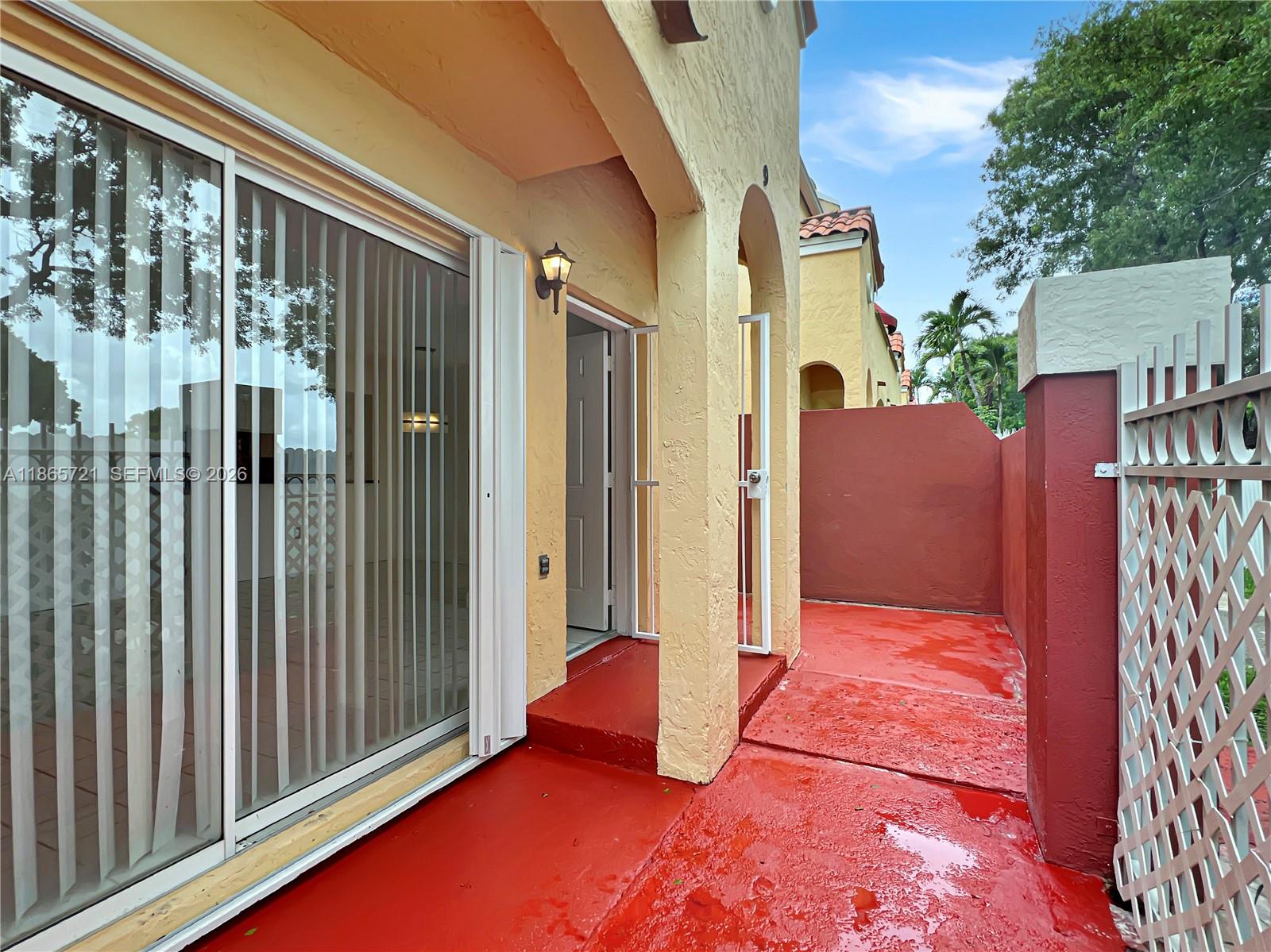 8515 Northwest 3rd Lane, Unit 1109 Miami, FL 33126 - Photo 14 of 14 a backyard of a house