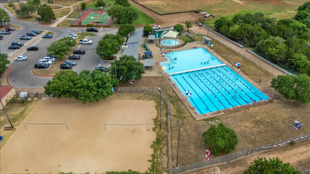 9012 Meacham Way Austin, TX 78749 - Photo 32 of 34 Community swimming pool with lap lanes and a separate wading area
