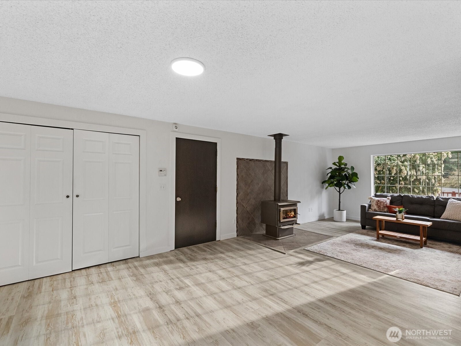 7822 Songbird Way Clinton, WA 98236 - Photo 6 of 28 a bedroom with furniture and a window