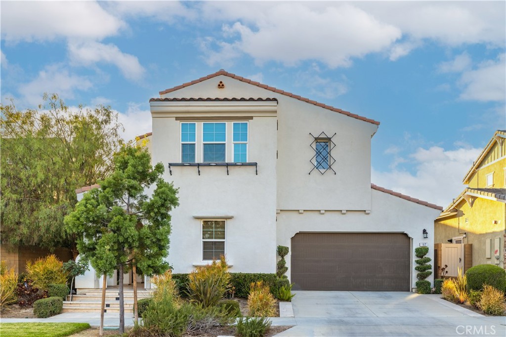 front view of a house with a street
