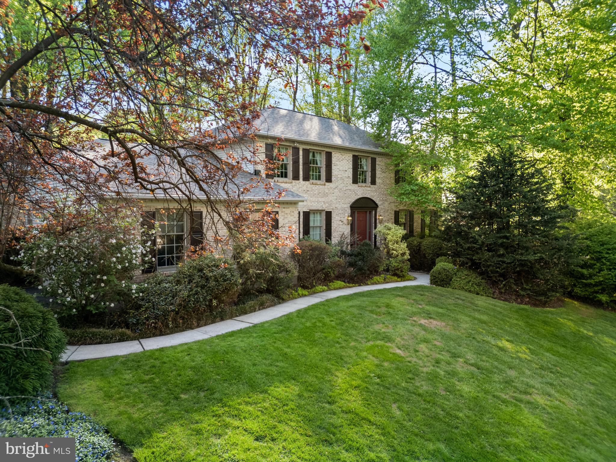 5 Radburn Lane Landenberg, PA 19350 - Photo 2 of 67 a front view of a house with a yard and trees