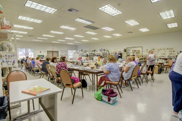a view of a dining room with lots of tables and chairs