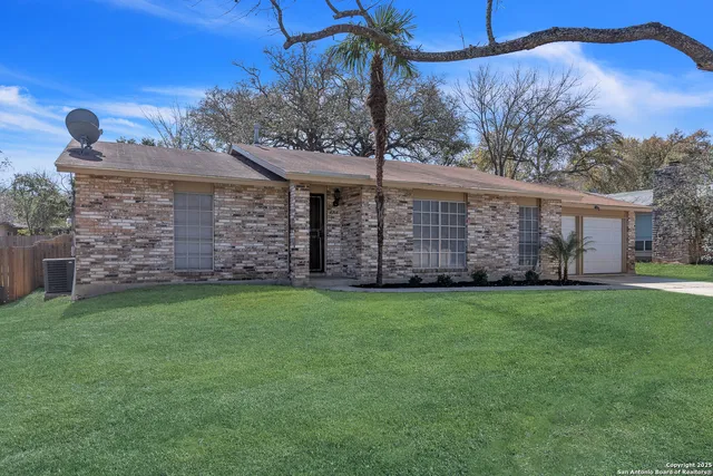 a view of a backyard with a garden