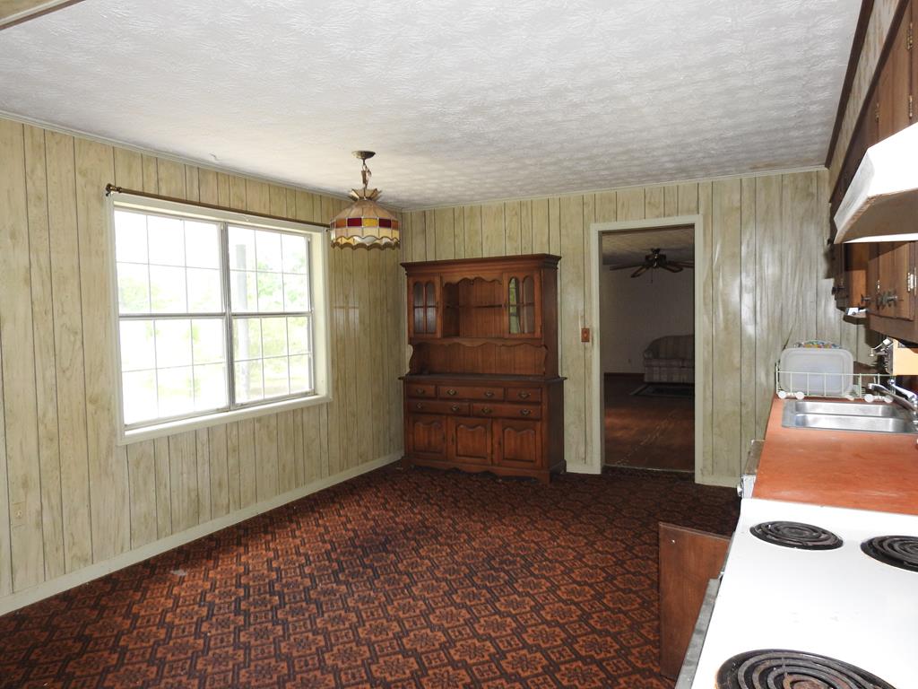 333 Lickskillet Road Epworth, GA 30541 - Photo 14 of 32 a room with furniture and a window