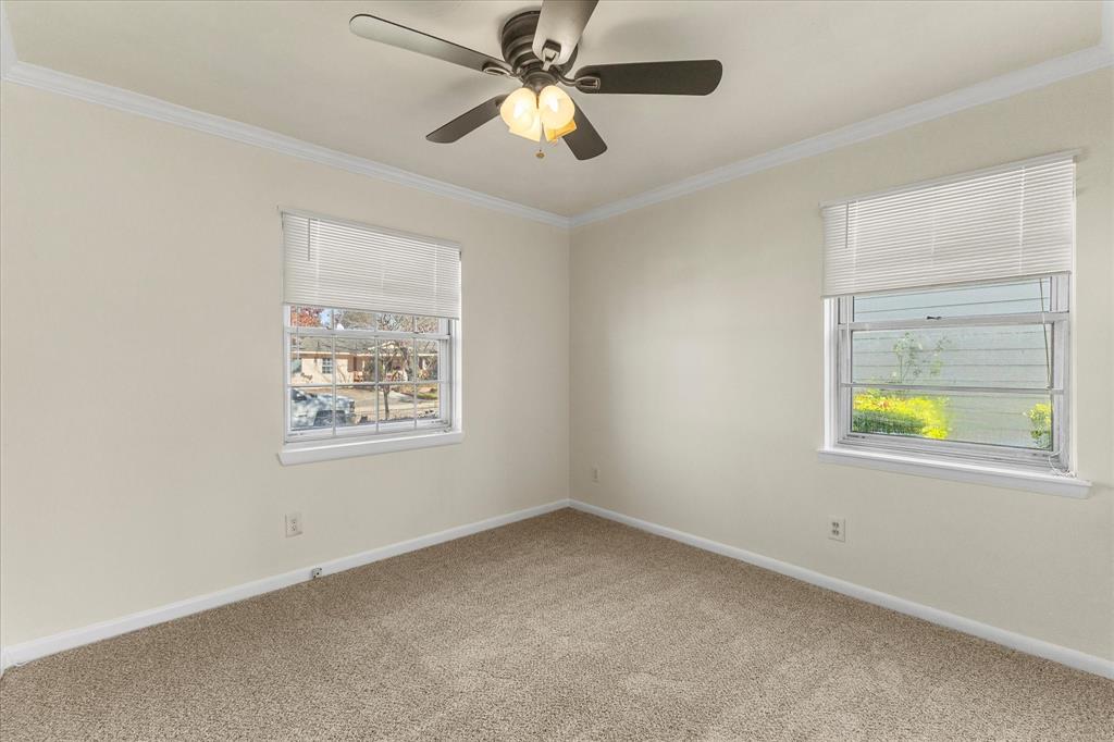 4110 Colgate Lane Garland, TX 75042 - Photo 19 of 22 a view of an empty room and a window