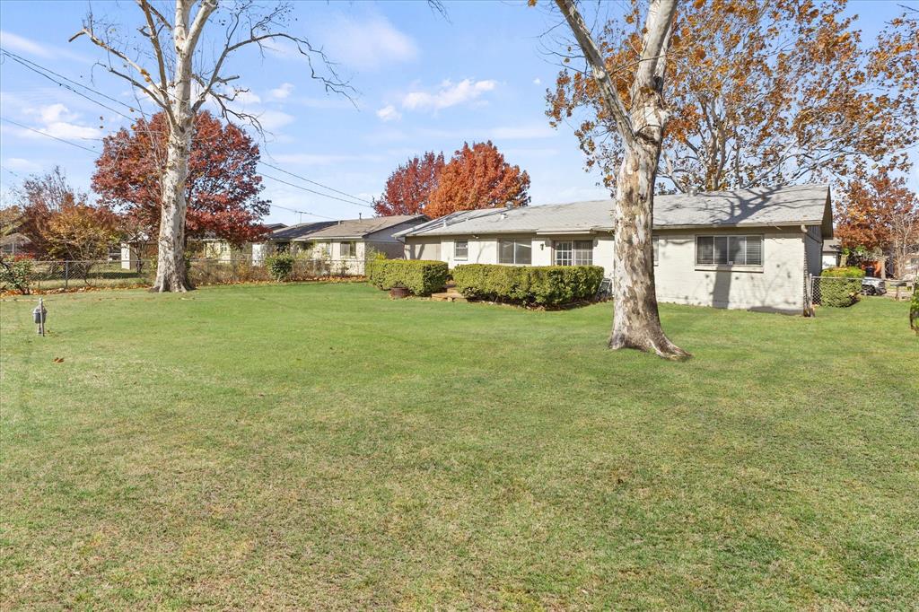 4110 Colgate Lane Garland, TX 75042 - Photo 4 of 22 a view of a house with a yard