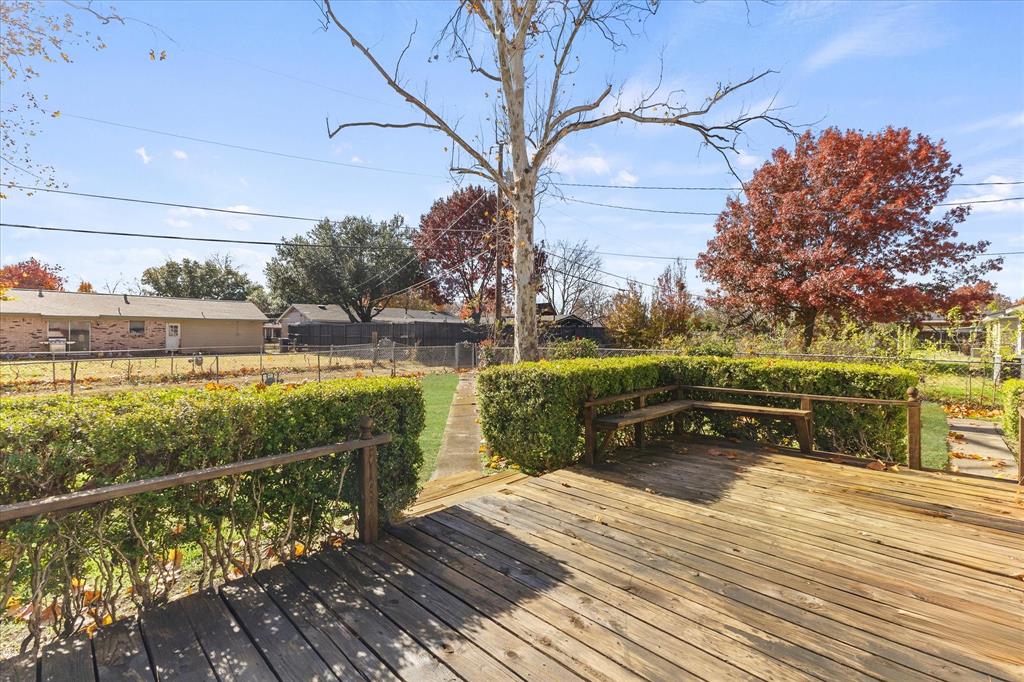 4110 Colgate Lane Garland, TX 75042 - Photo 6 of 22 a view of a wooden deck with lake view