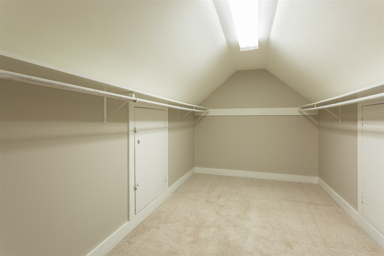 8816 Woodstone Drive Raleigh, NC 27615 - Photo 21 of 30 This walk-in-closet is like having an extra room. Plenty of room and access to the two floored attic areas. 3rd Bedroom Walk-In-Closet