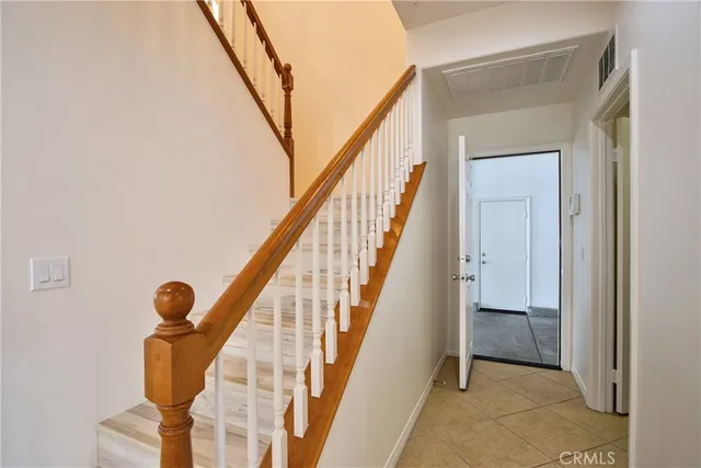 a spacious bathroom with a granite countertop tub sink and mirror
