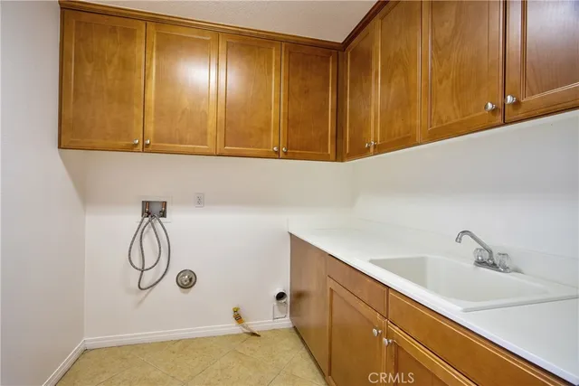 a spacious bathroom with a granite countertop tub sink and mirror