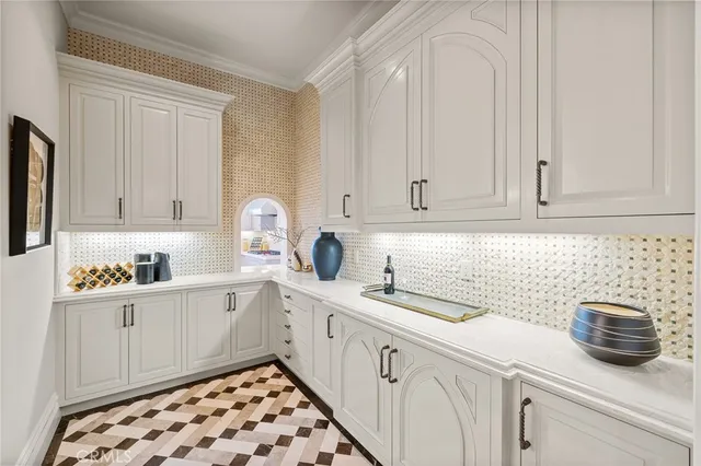 a view of staircase with railing and white walls