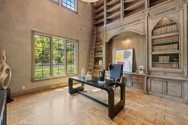 a close view of a sink a faucet and a stove in kitchen