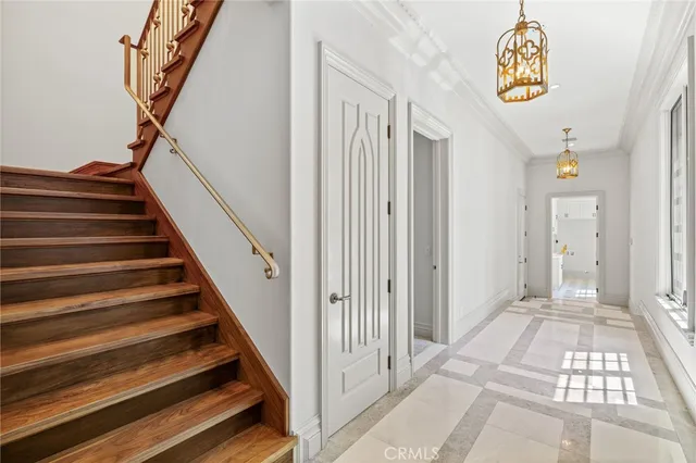 a bedroom with a bed and a chair