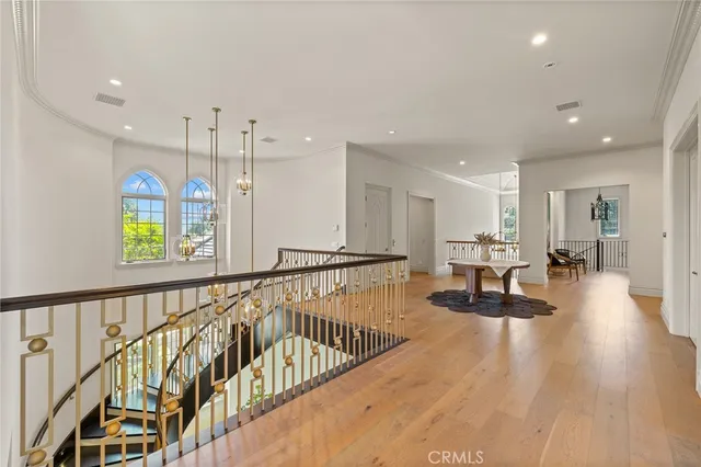 a view of room with stairs and a wooden table