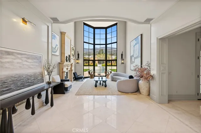 a large kitchen with a table and chairs